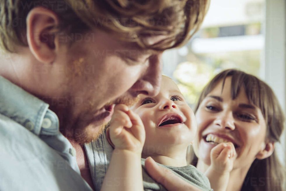 happy couple with baby MFF03812
