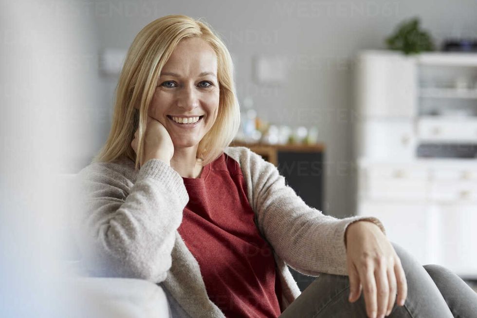 happy woman relaxing at home RBF06289