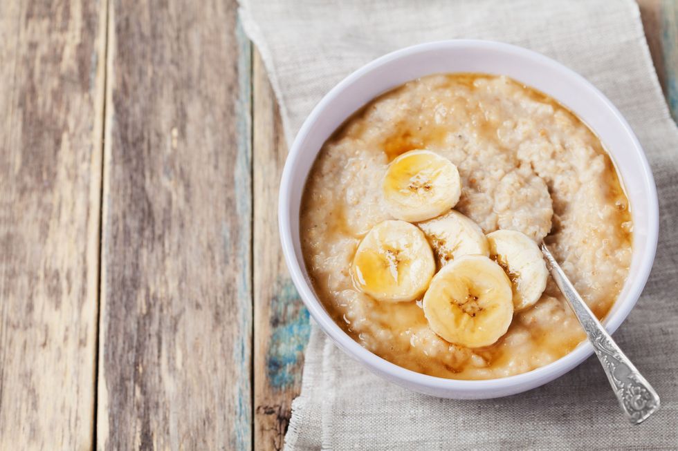 healthy breakfast oatmeal porridge with banana with royalty free image 497816548 1536269148