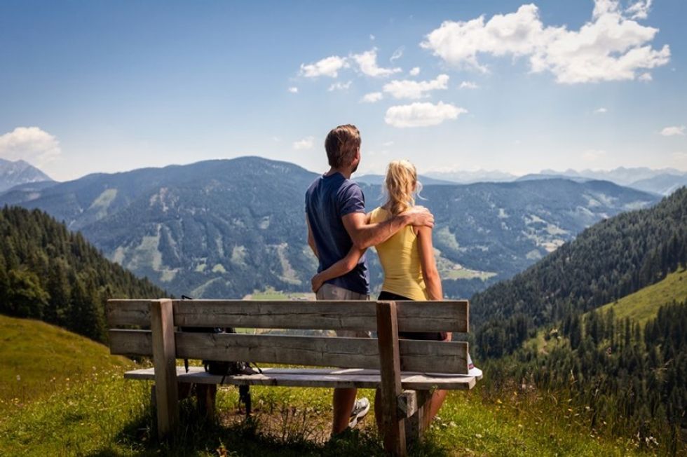 hikers in the alps summer e1619696844943