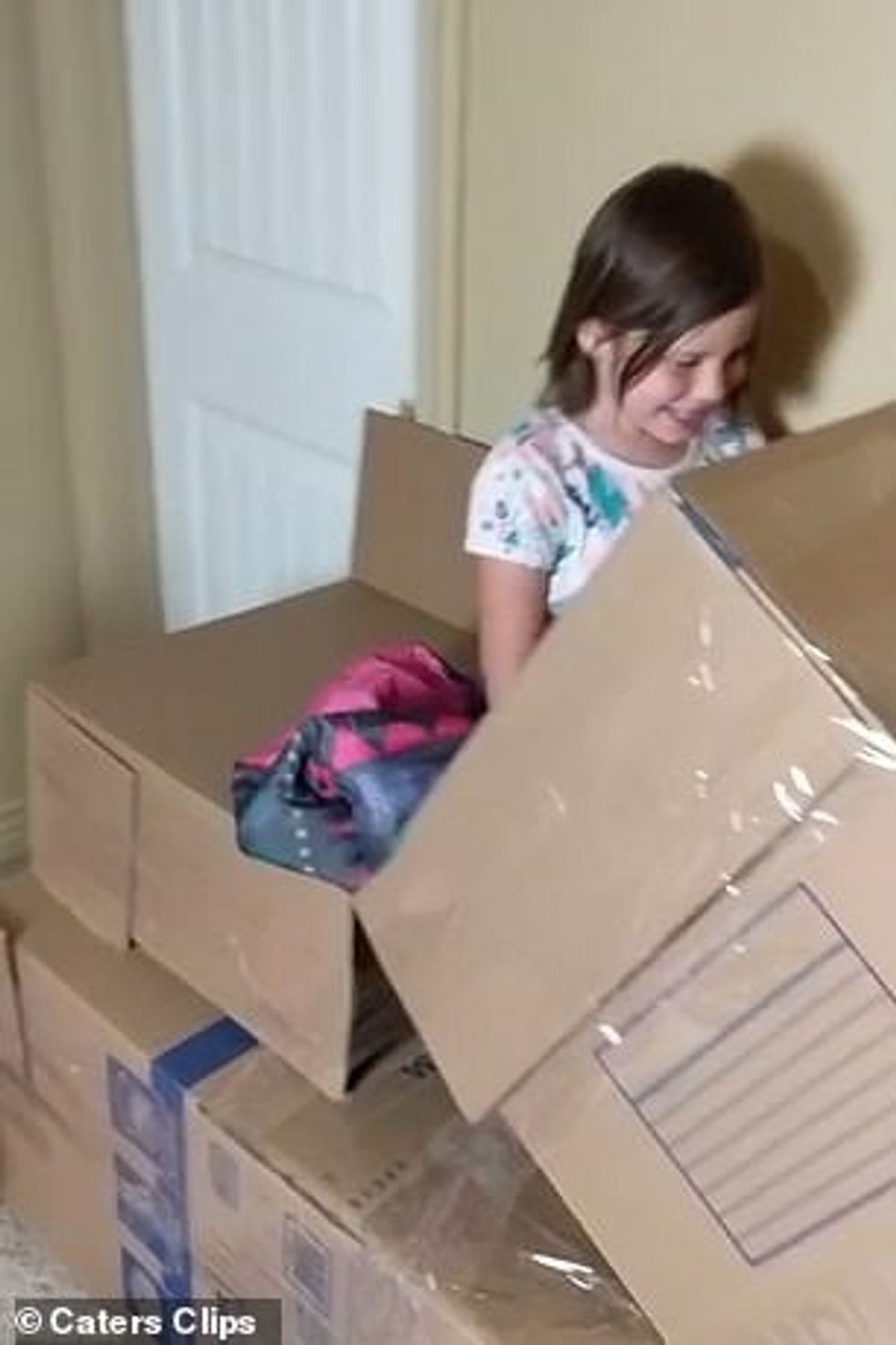 His daughter screams as she slides down the stairs and tells her father it is 'super fast'
