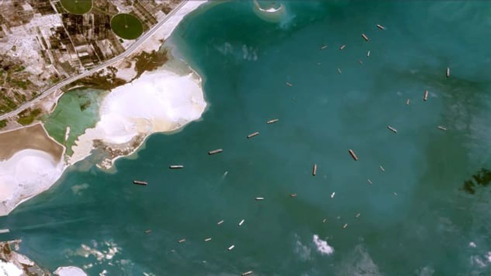 http cdn.cnn .com cnnnext dam assets 210326085515 03 suez canal anchored ships 0325