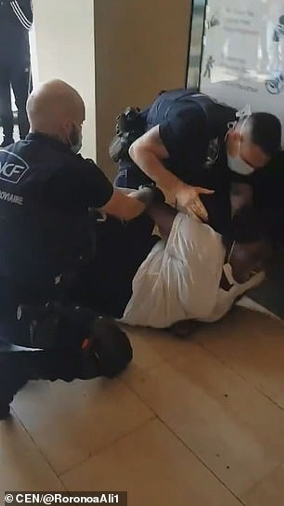 'I did not insult them, I did not hit them, I don't understand why they tackled me to the floor,' she said. 'Every time I see this footage, I have to cry. I see the images in my head.'