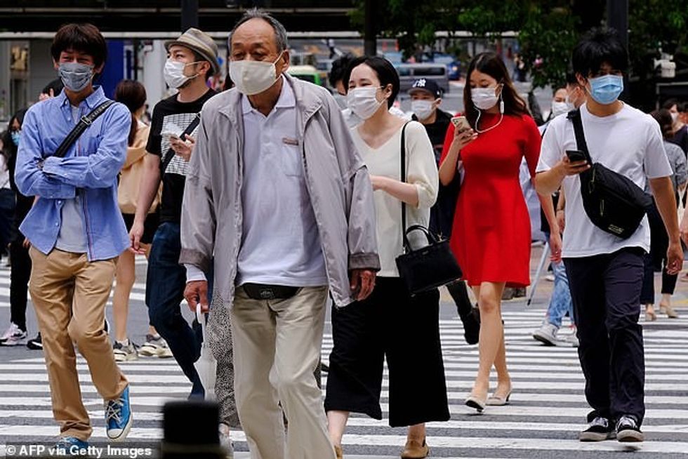 If the June vote is passed, Yamato will become the first city in Japan to ban walking while looking at a phone (file photo)