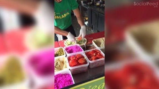 2016/06/socialfeed.info-a-street-food-stall-worker-has-been-dubbed-london-s-falafel-wrap-master-e1466072942804.jpg