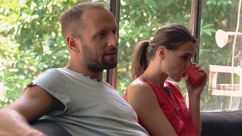 2018/07/videoblocks-sad-serious-couple-talking-and-drinking-beverages-sitting-at-home_bdztiuznqx_thumbnail-full15.jpg