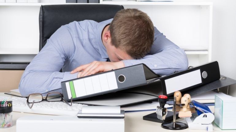 2019/05/Young-exhausted-man-is-lying-on-the-desk-in-office-770x433.jpg