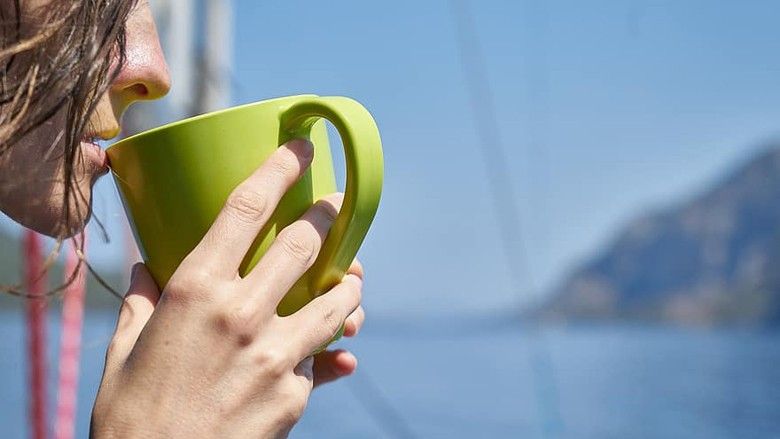 2020/07/woman-coffee-drink-green-glass-cup-marine-holiday-hot.jpg