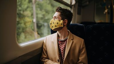 2020/07/0_Train-commuter-wearing-PPE-face-mask-for-safety.jpg