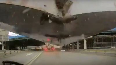2020/11/Dashcam-captures-image-of-concrete-bridge-collapse-before-hitting-car.jpg