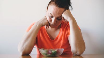 2021/04/unhappy-woman-doesnt-want-to-eat-salad-healthy-diet.jpg