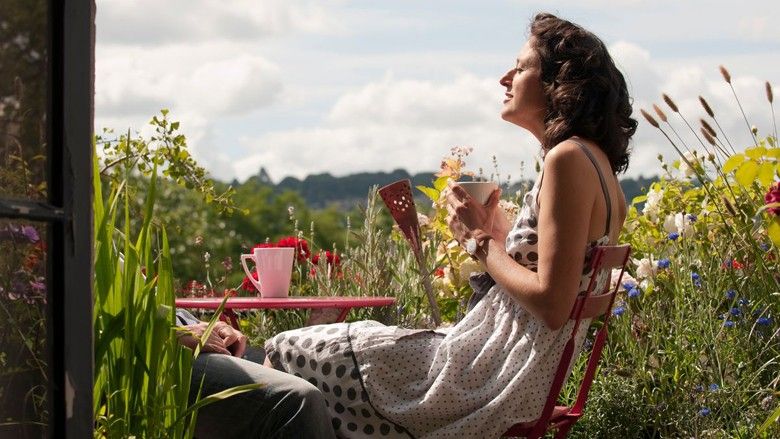 2021/06/0_woman-on-balcony-drinking-tea.jpg