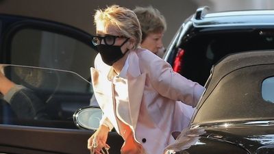 2021/08/sharon-stone-in-a-pink-blazer-and-matching-pink-purse-at-toscana.jpg