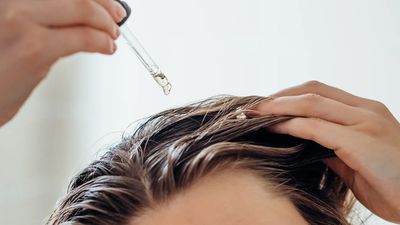 2024/04/Oil-for-Hair-woman-applying-oil-to-her-scalp.jpg