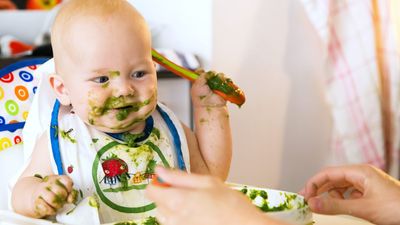 2024/09/baby-eating-spinach.jpg