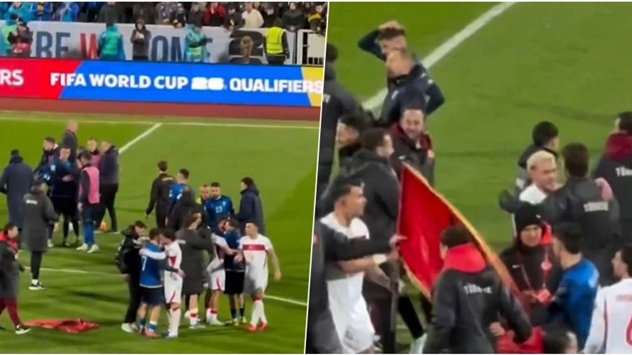 Tifozi kosovar e gjuajti flamurin kombëtarë në tokë, futbollisti turk e mori atë dhe ia dha Rashicës Tifozi kosovar e gjuajti flamurin kombëtarë në tokë, futbollisti turk e mori atë dhe ia dha Rashicës