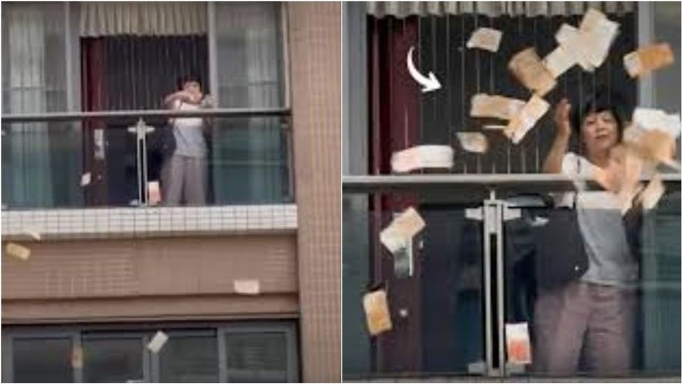 “Shi parash” nga qielli, një grua thuet se hodhi para në vlerë 150 mijë dollarë nga apartamenti i saj në Kinë