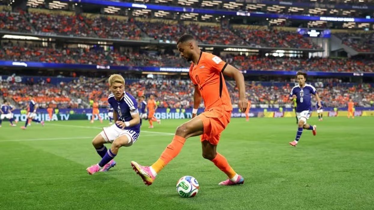 Holanda dhe Japonia ndajnë pikët në dramën e katër golave Holanda dhe Japonia ndajnë pikët në dramën e katër golave