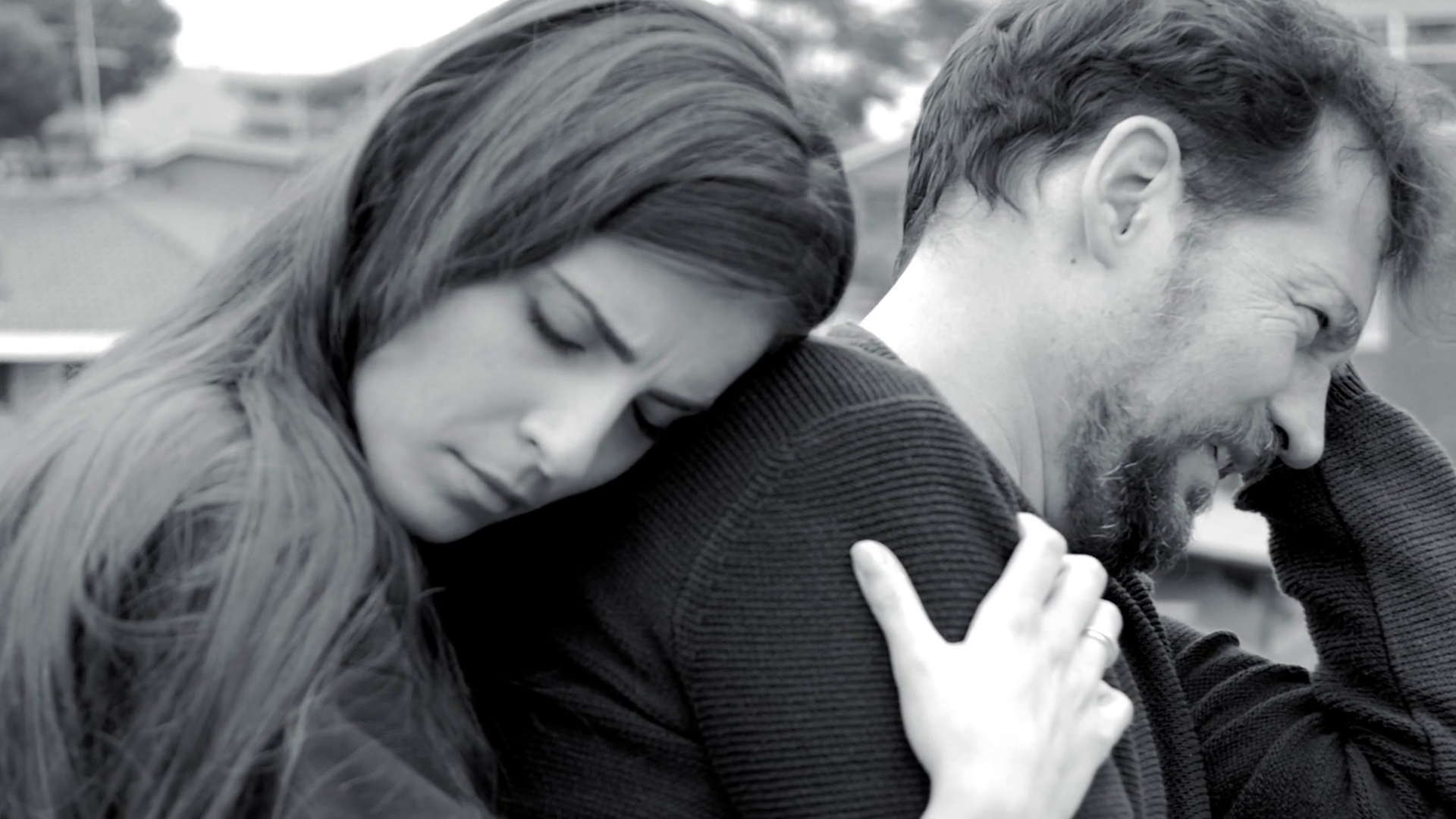 2019/09/videoblocks-woman-sad-hugging-strong-crying-boyfriend-black-and-white_sp1vdta1w_thumbnail-full01.png