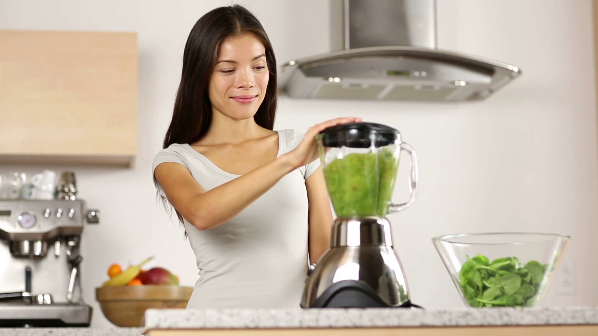 2019/09/videoblocks-green-smoothie-woman-making-vegetable-smoothie.png