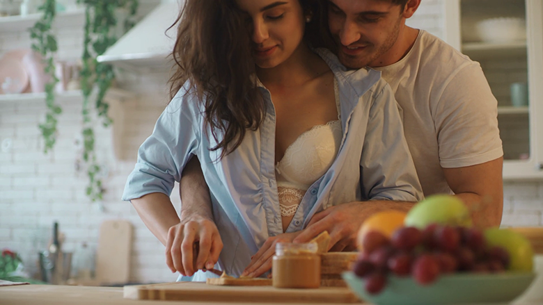 2022/11/videoblocks-happy-couple-cooking-together-at-home-close-up.png