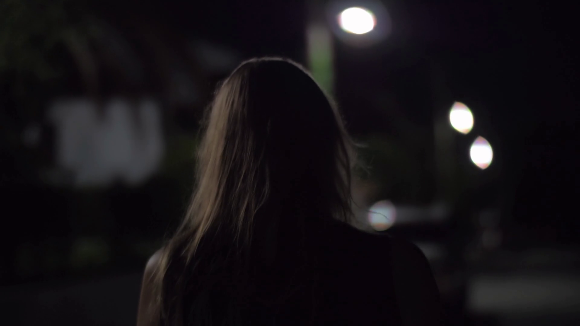 2023/01/videoblocks-back-view-of-a-young-woman-walking-in-desert-poorly-lighted-street-she-is-scared-to-be-alone-outside-at-night_hu1kuhej8_thumbnail-1080_01.png