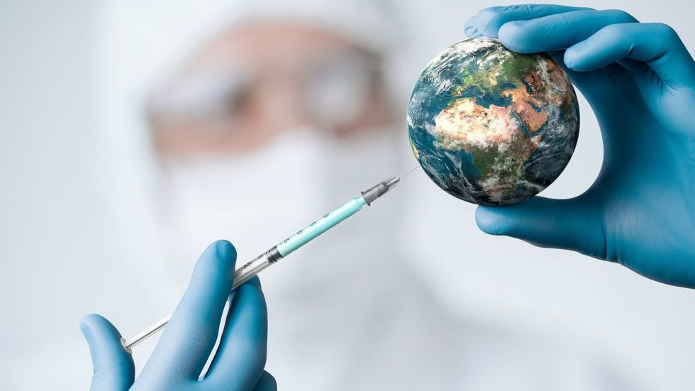 injecting covid 19 vaccine into globe