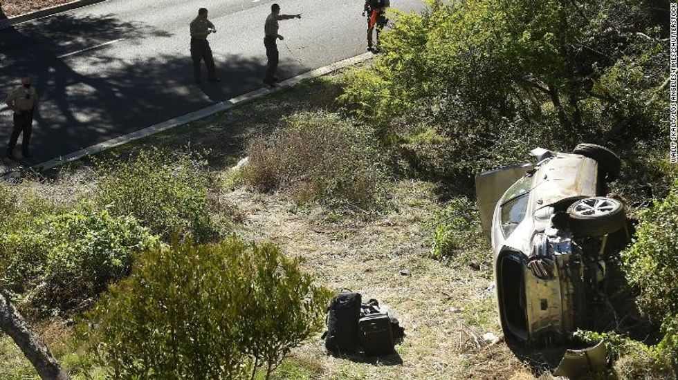 Investigators examine the scene of the accident on Hawthorne Boulevard in Rancho Palos Verdes, California.