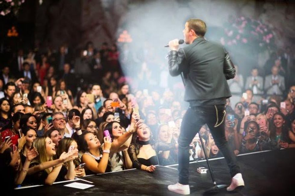 It was a 15th birthday party - or Quinceañera - like no other. But then Maya Henry is not your average teenager. The star-studded $6 million extravaganza featured entertainment from J-Lo collaborator Pitbull and Nick Jonas from the Jonas Brothers. Maya wore a bespoke Rolando Santana gown, her make-up was created by Patrick Ta, who has worked with the Kardashians, and photography was by Donna Newman, whose customers range from Oscar winner Matt Damon to First Lady of the US Michelle Obama. A team of 150, headed by New York social event planner David Monn, masterminded every detail at the party at the 55,000 square foot facility constructed to house the party at six flags over Texas.in San Antonio, including 30-foot tall cherry trees in full blossom. A Garden room complete with walls of roses, flowing fountains and 30foot tall cherry blossom and a main ballroom bursting with oversized planters overflowing with fresh Peonies, rows of swanky lounge furniture and dazzling flutters of butterflies suspended from the deiling. Maya Henry's name is fast becoming synonymous with philanthropy and community engagement. Following in the footsteps of her father, lawyer Thomas J Henry, she has worked with several charities including the San Antonio YES Foundation, which helps distribute school supplies to children in need. In 2010, at the age of nine, she launched Maya's Corner, an endeavor to promote and assist causes benefitting children. And she is also putting her high profile social media presence behind Democrat candidate Hillary Clinton's campaign. Using the hashtag #teensforhillary, Maya hopes to mobilize her thousands of Instagram followers to support the Clinton campaign and to bring awareness to issues involving female empowerment and opportunities for Latina America women The unforgettable private event was attended by 600 including many of San Antonio's social and cultural elite, who rejoiced with Maya and her family in the celebration of her Mexican heritage, commitment to family, friends, tradition, and community. Although only a freshman in high school, the young San Antonio socialite has already positioned herself as a regular on the Texas Tennis Championship circuit. She/Her proud father said: Maya is a smart, driven, outstanding young woman. She has already worked so hard to get where she is with her studies, tennis and activism. Her Mother and I wanted to give her an unforgettable night to mark her transition into young adulthood. We are so excited to see what the future holds for Maya.