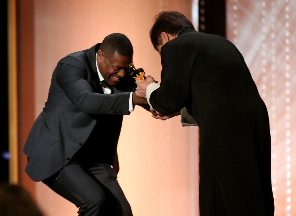 Jackie Chan dhe Chris Tucker duke u argëtuar në skenë. (Getty Images)