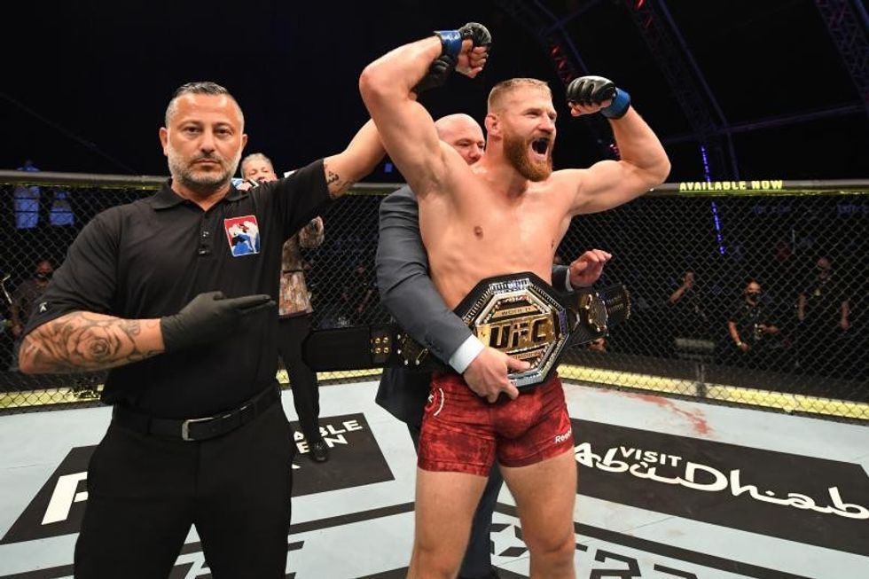 Jan Blachowicz of Poland celebrates after defeating Dominick Reyes in their light heavyweight championship bout during UFC 253 inside Flash Forum on UFC Fight Island on September 27, 2020 in Abu Dhabi, United Arab Emirates. (Photo by Josh Hedges/Zuffa LLC)