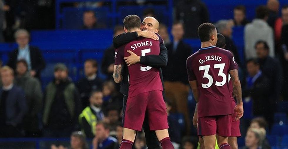 John Stones Pep Guardiola e1634323102756