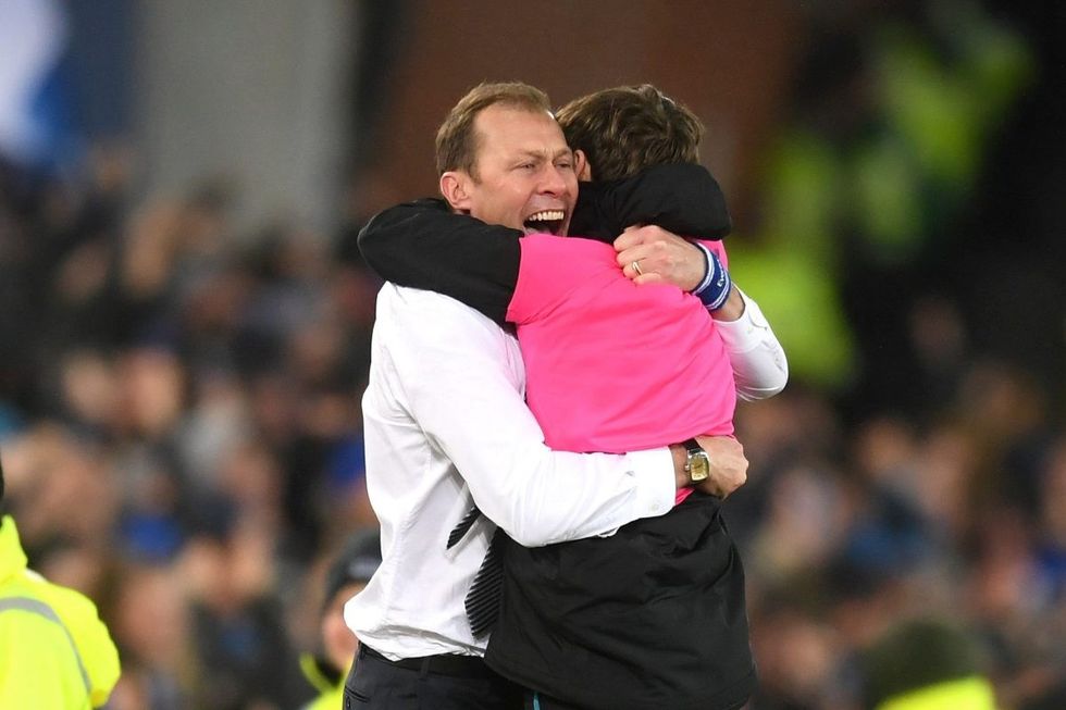Jubilant Everton boss Duncan Ferguson celebrates with the ballboy AGAIN