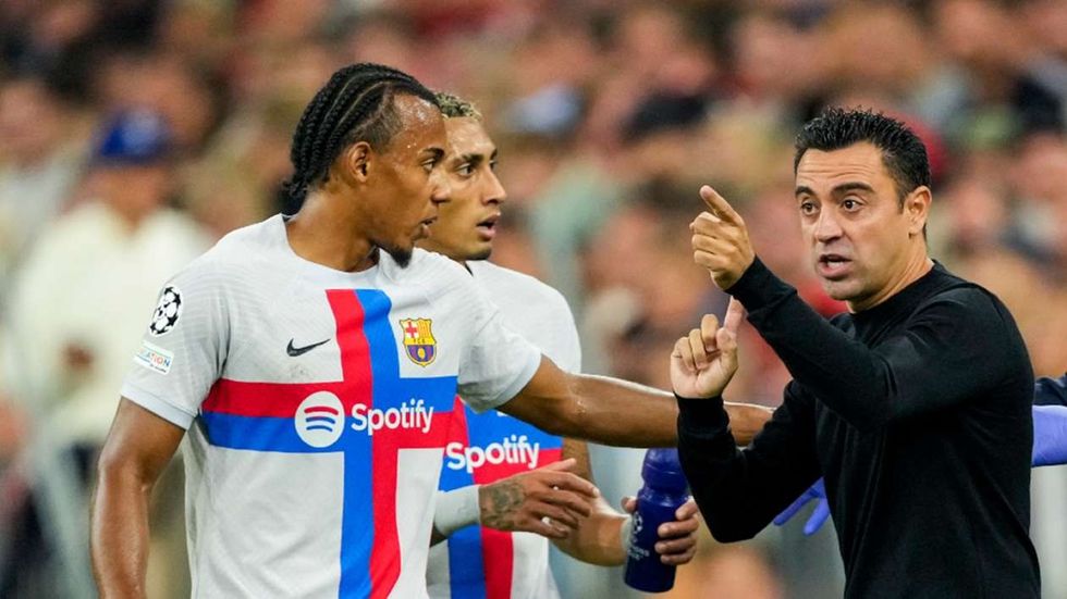 jules kounde and xavi 1e4blj69eb8w2125e1og4e4ia1