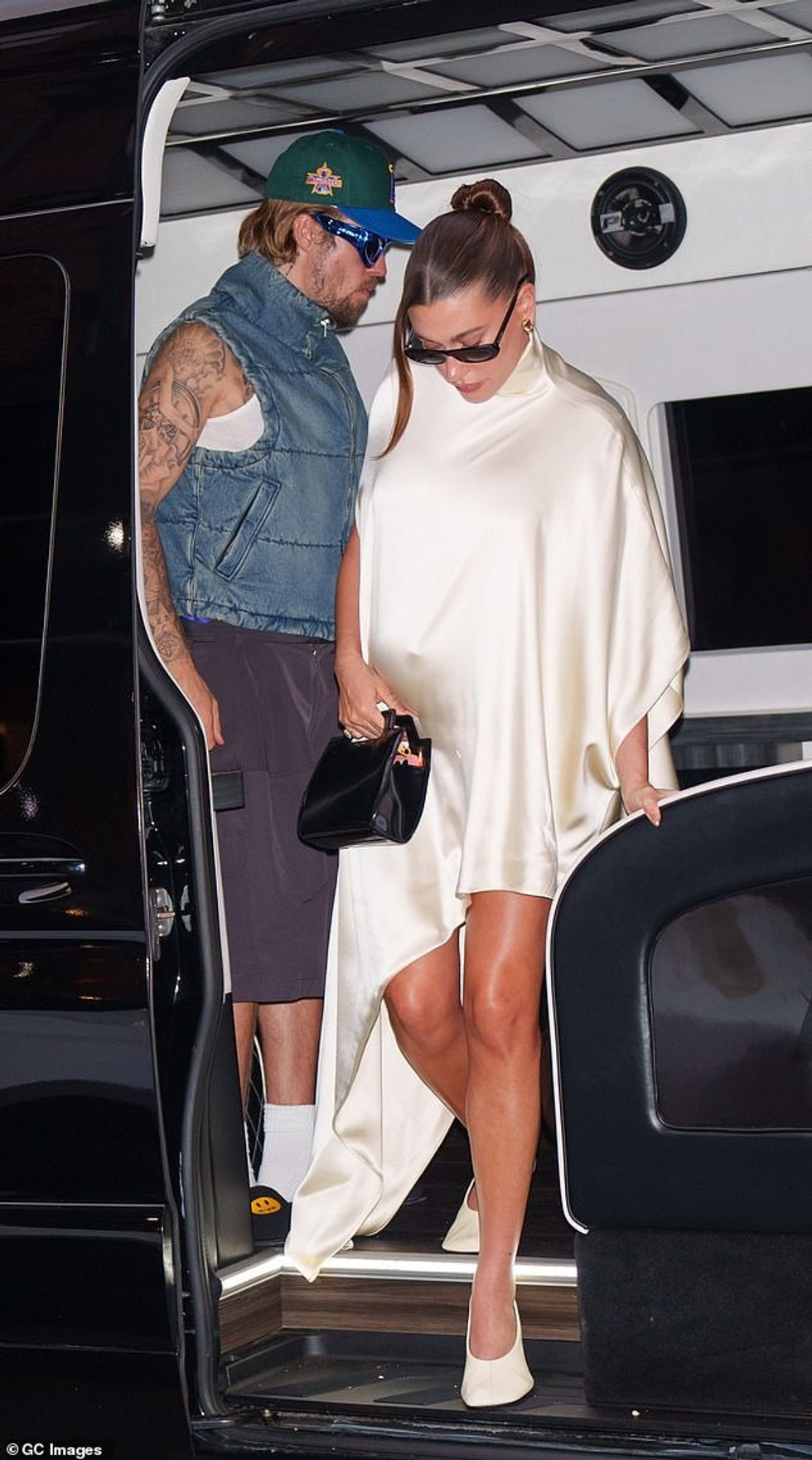 Justin wore futuristic sporty blue sunglasses