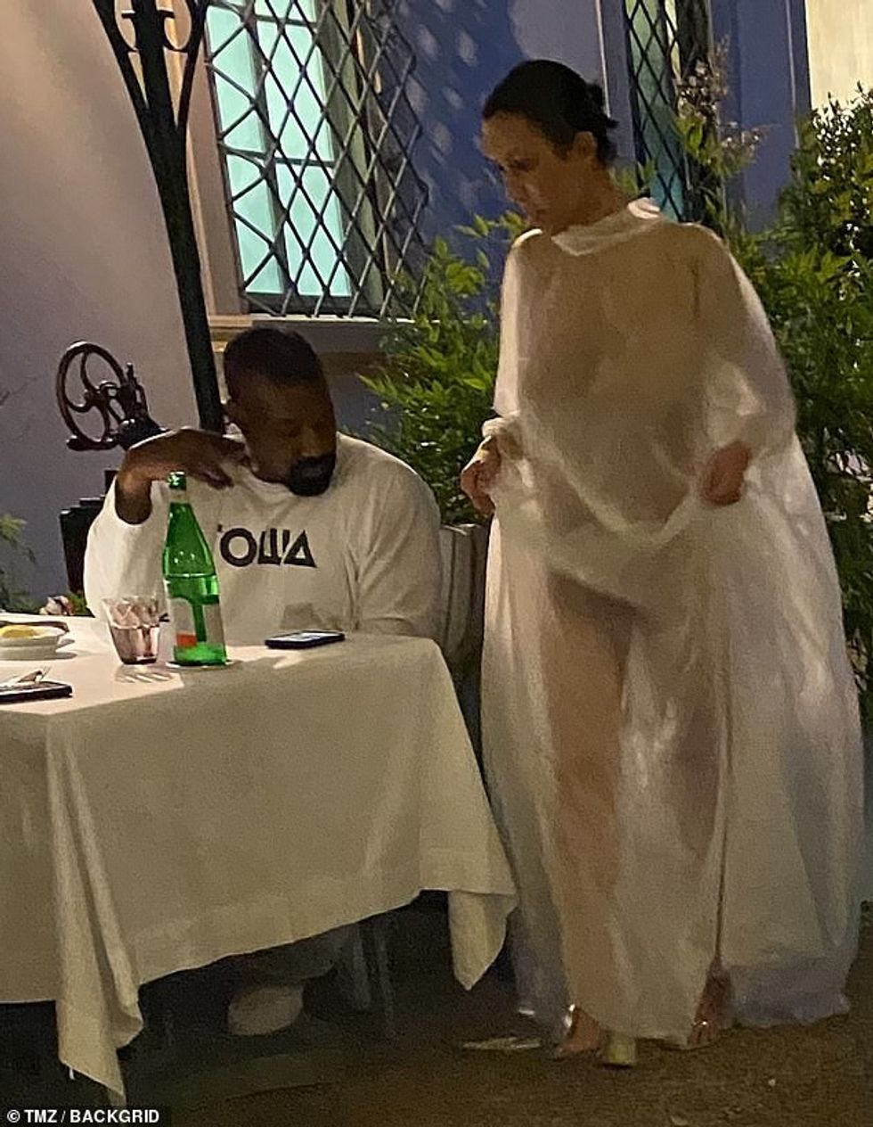 Kanye West's wife Bianca Censori left little to the imagination in another very risqué outfit on Thursday as she opted out of underwear underneath a sheer cloak-like dress for a dinner date at Il Palagio restaurant in Florence, Italy