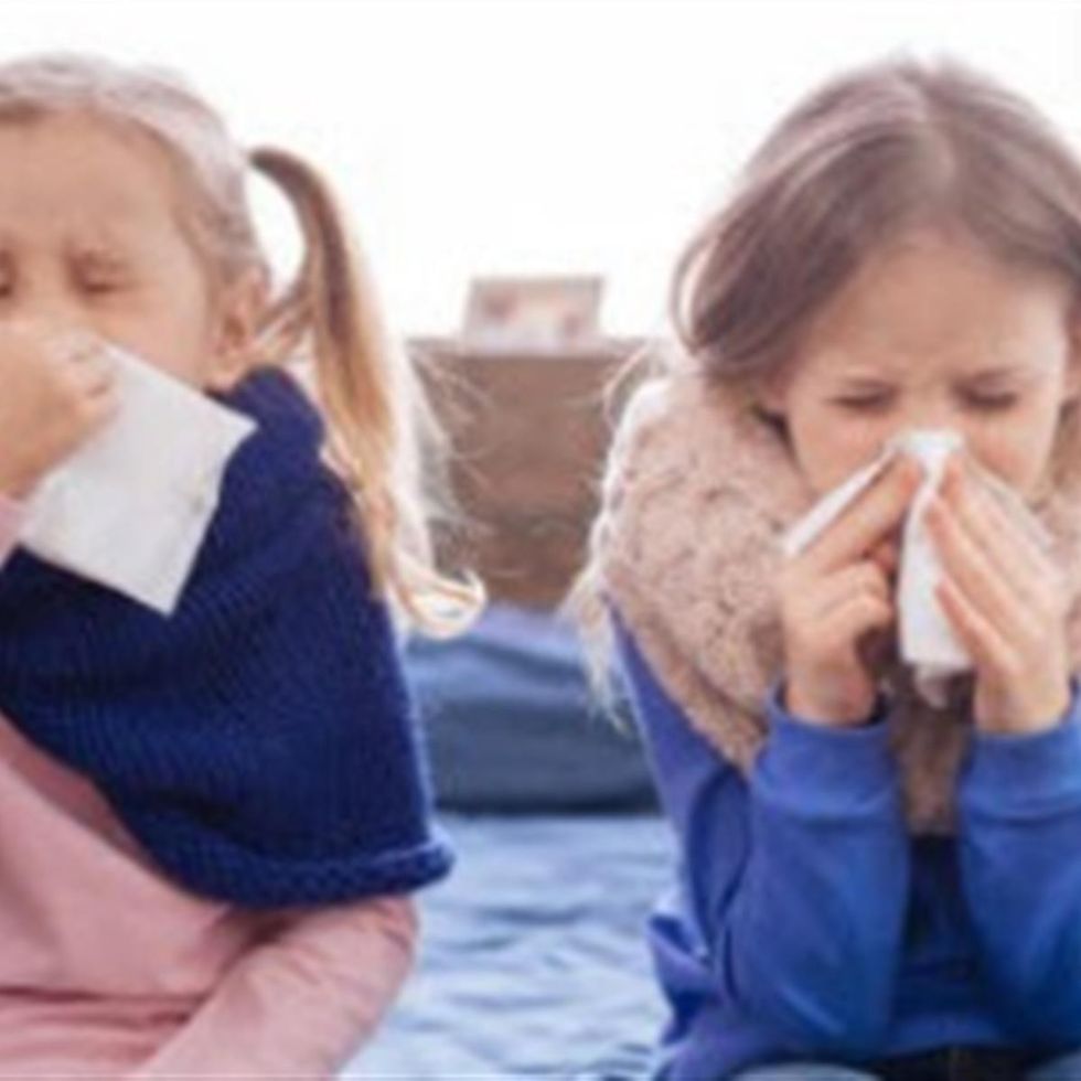 kids blowing nose tissues