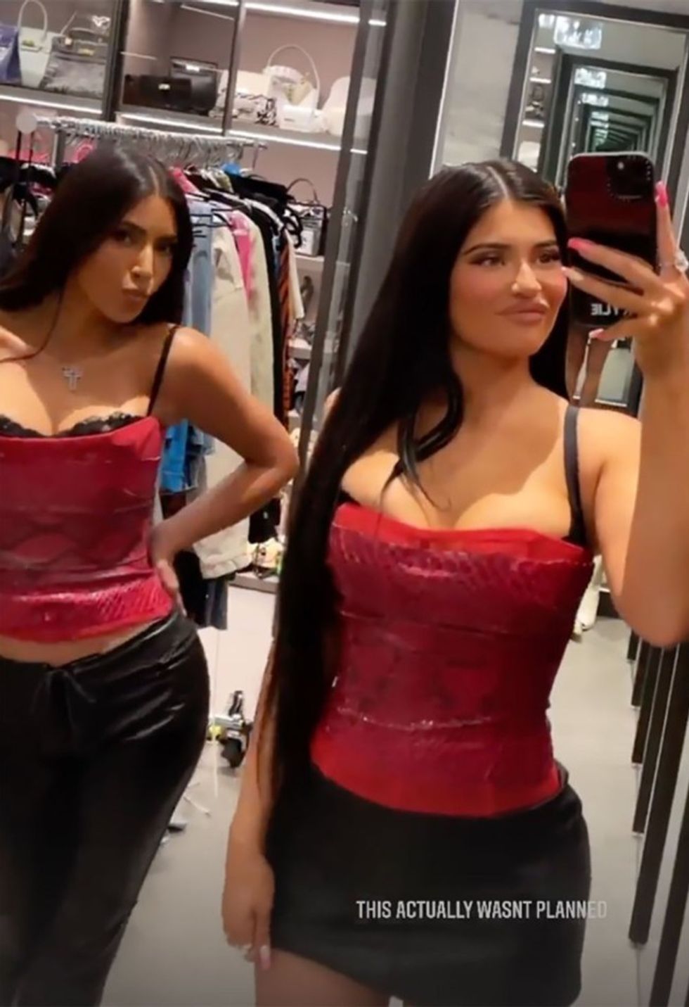 kim kardashian kylie jenner matching snakeskin corsets