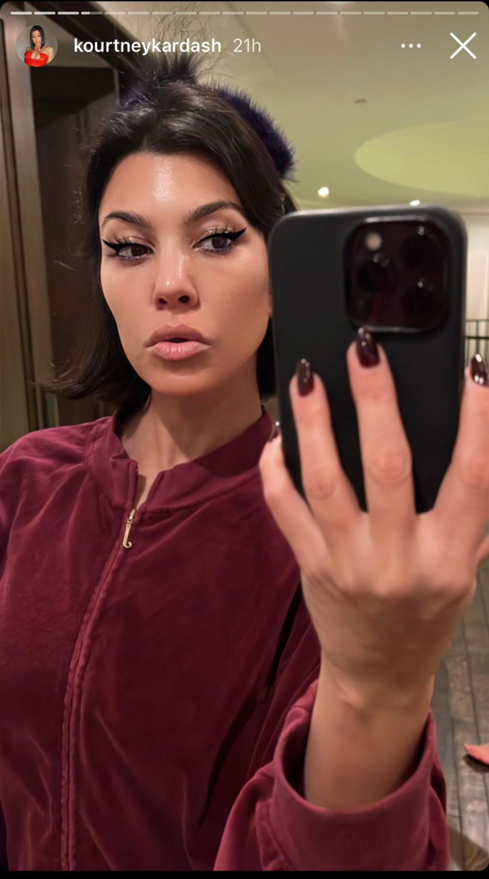 kourtney kardashian 60s inspired winged eyeliner 1638797290
