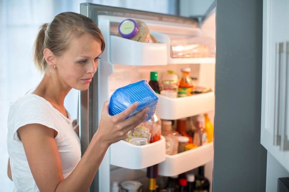 lady expired food fridge jpg q67 crop smart