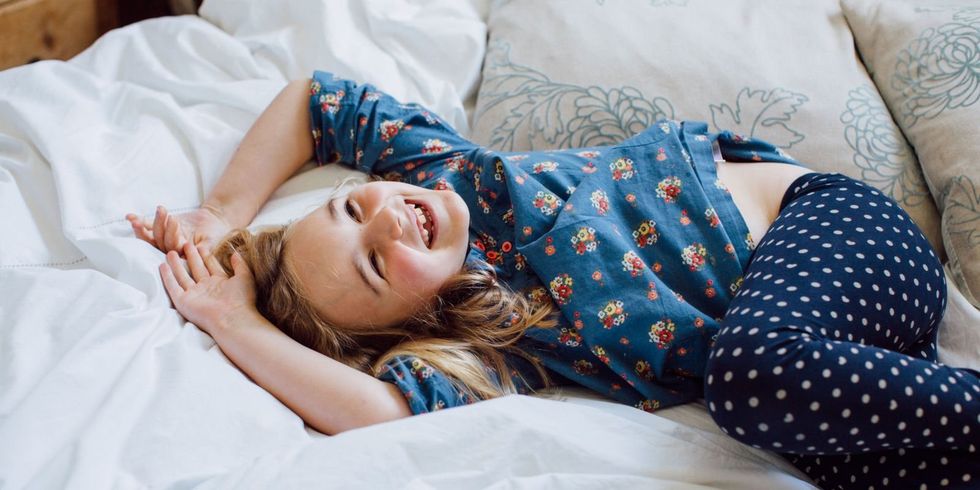 landscape 1480607877 girlonbed