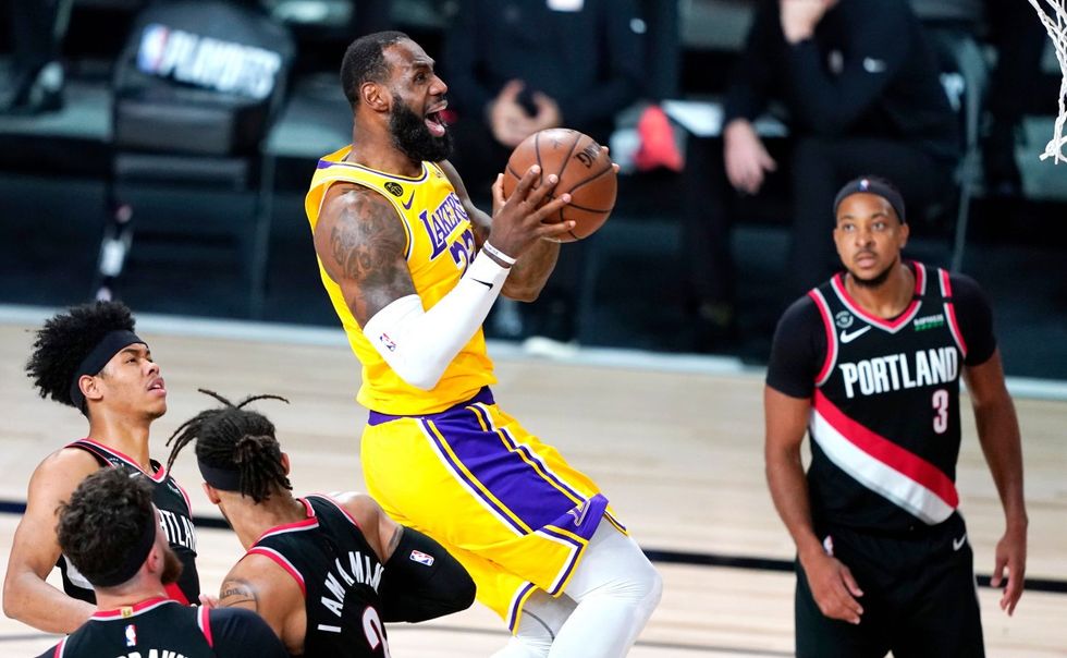 LeBron James triple double helps Lakers eliminate Trail Blazers