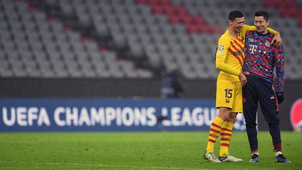 lenglet y lewandowski rien tras el bayern barcelona. afp