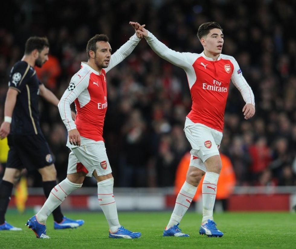 LONDON, ENGLAND - NOVEMBER 24: Santi Cazorla and Hector Bellerin of Arsenal celebrate the 1st goal during the match between Arsenal and Dinamo Zagreb in the UEFA Champions League on November 24, 2015 in London, United Kingdom. (Photo by David Price/Arsenal FC via Getty Images)