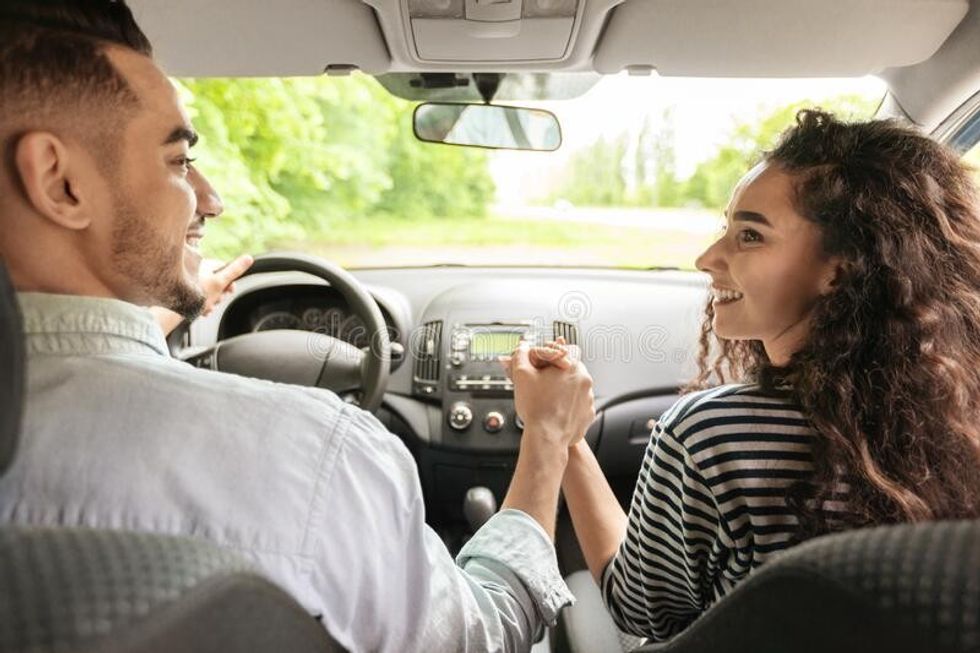 loving couple holding hands sitting au