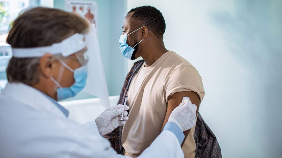 Male Doctor Patient Vaccine header 1