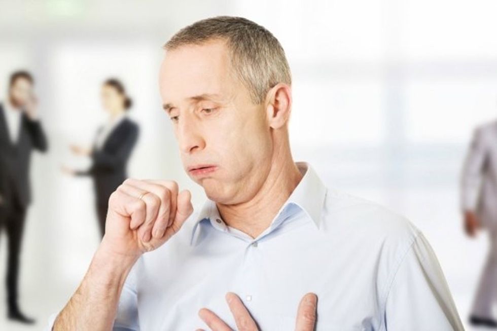 man coughing body resized