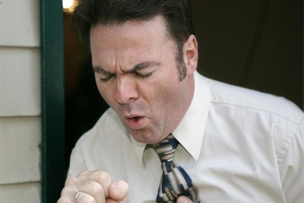 man-in-white-shirt-coughing-hardly