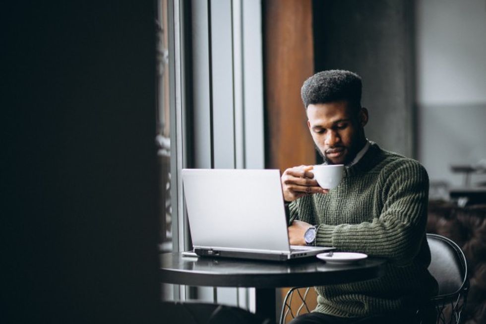man working laptop cafe 1303 7029