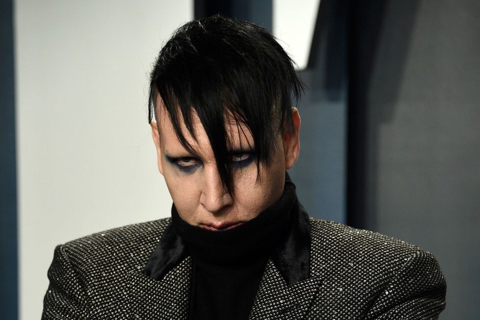 manson sues evan rachel wood